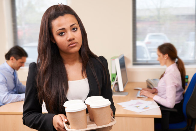 Digital marketing intern holds coffee for public relations employees but they don