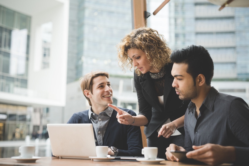 Digital marketing intern looks up candidly at public relations agency leader for support.